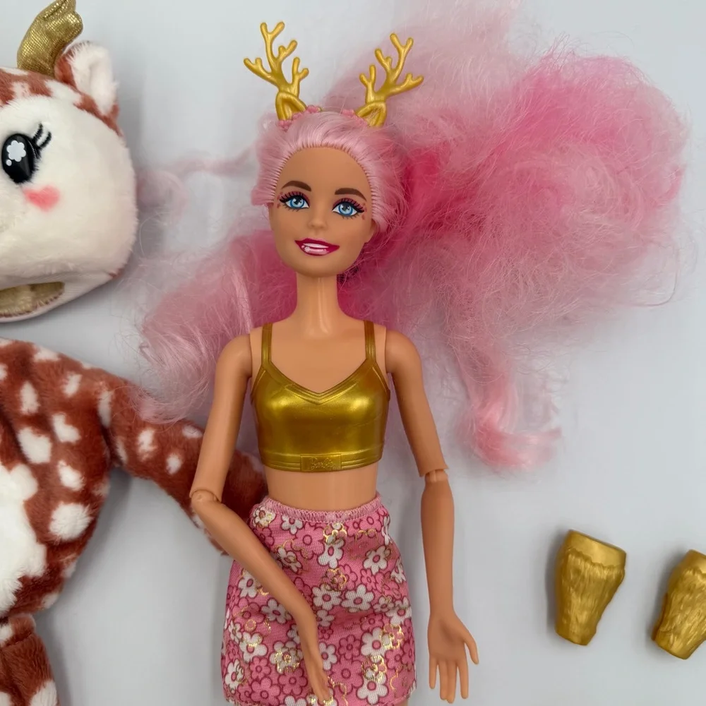 Barbie Cutie Reveal Snowflake Sparkle Series Doll with a deer plush costume